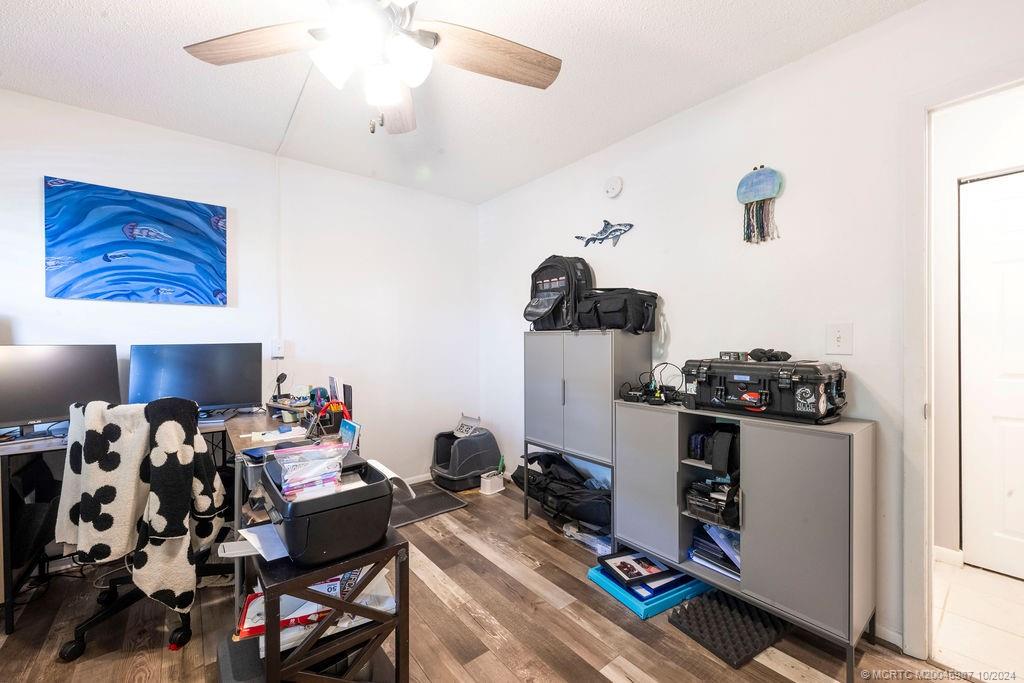 1900 South Kanner Highway, Unit 9202 Stuart, FL 34994 - Photo 43 of 55 a bedroom with furniture and a window