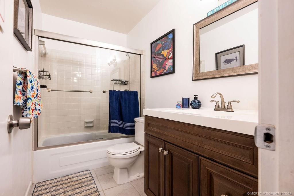 1900 South Kanner Highway, Unit 9202 Stuart, FL 34994 - Photo 45 of 55 a bathroom with a sink a toilet and shower