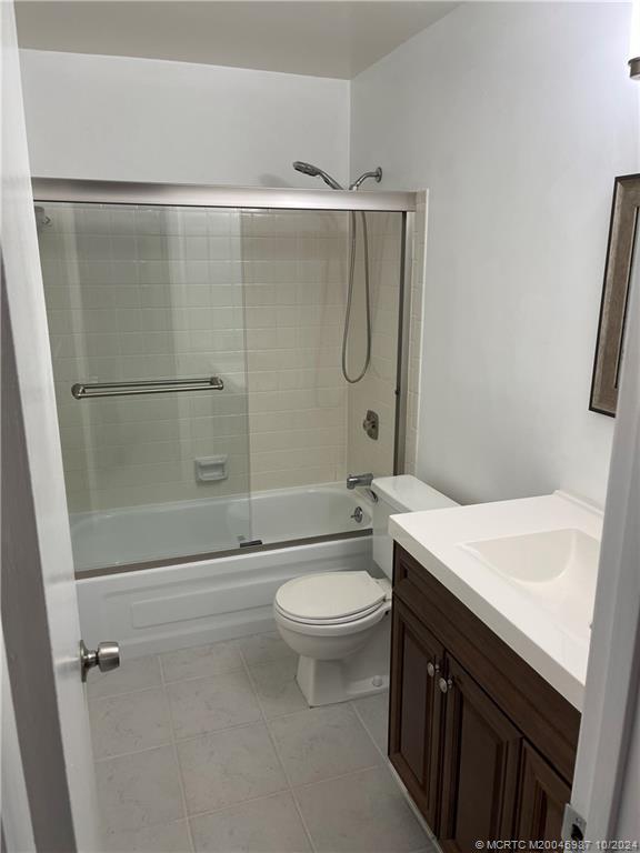 1900 South Kanner Highway, Unit 9202 Stuart, FL 34994 - Photo 46 of 55 a bathroom with a granite countertop sink toilet and shower