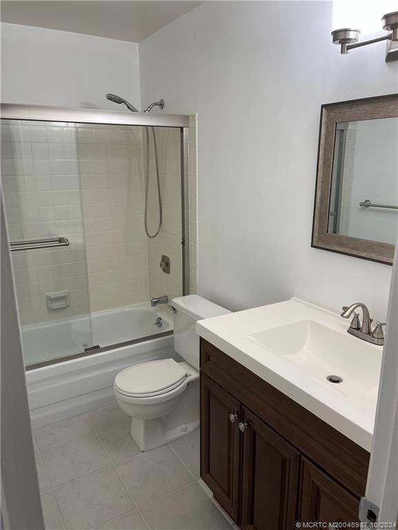 1900 South Kanner Highway, Unit 9202 Stuart, FL 34994 - Photo 47 of 55 a bathroom with a sink a toilet and shower