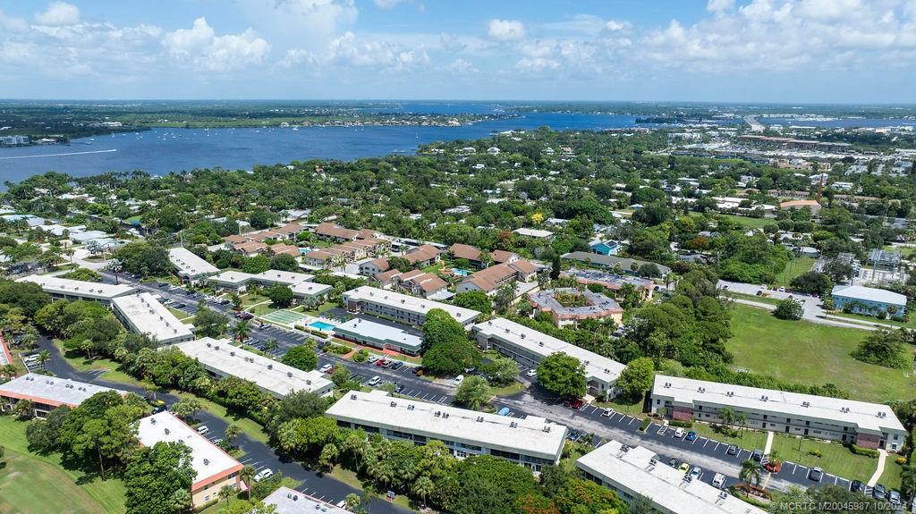 1900 South Kanner Highway, Unit 9202 Stuart, FL 34994 - Photo 7 of 55 an aerial view of a city with lots of residential buildings ocean and mountain view in back