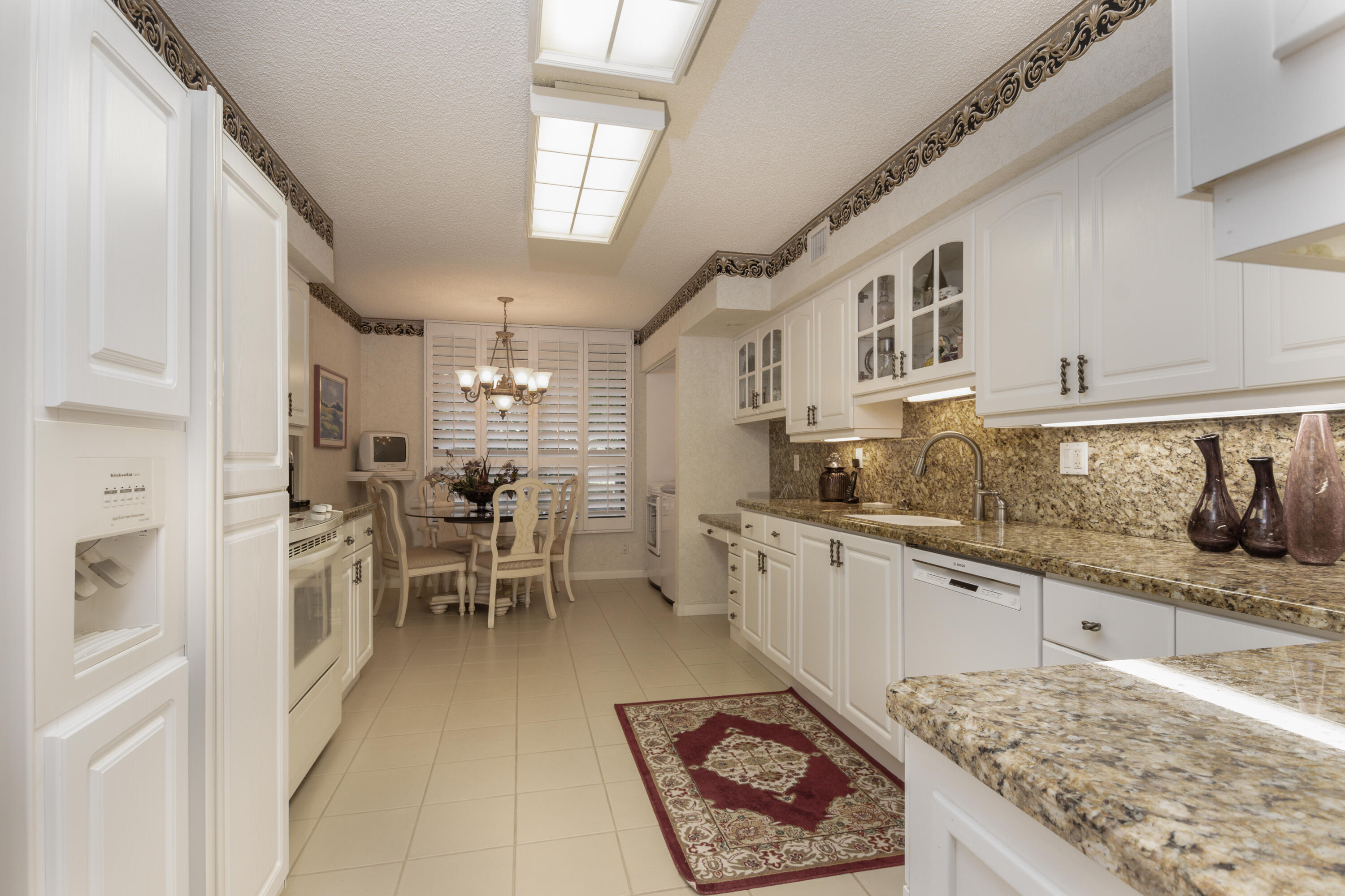 7564 Regency Lake Drive, Unit A101 Boca Raton, FL 33433 - Photo 14 of 33 Kitchen and Breakfast Nook