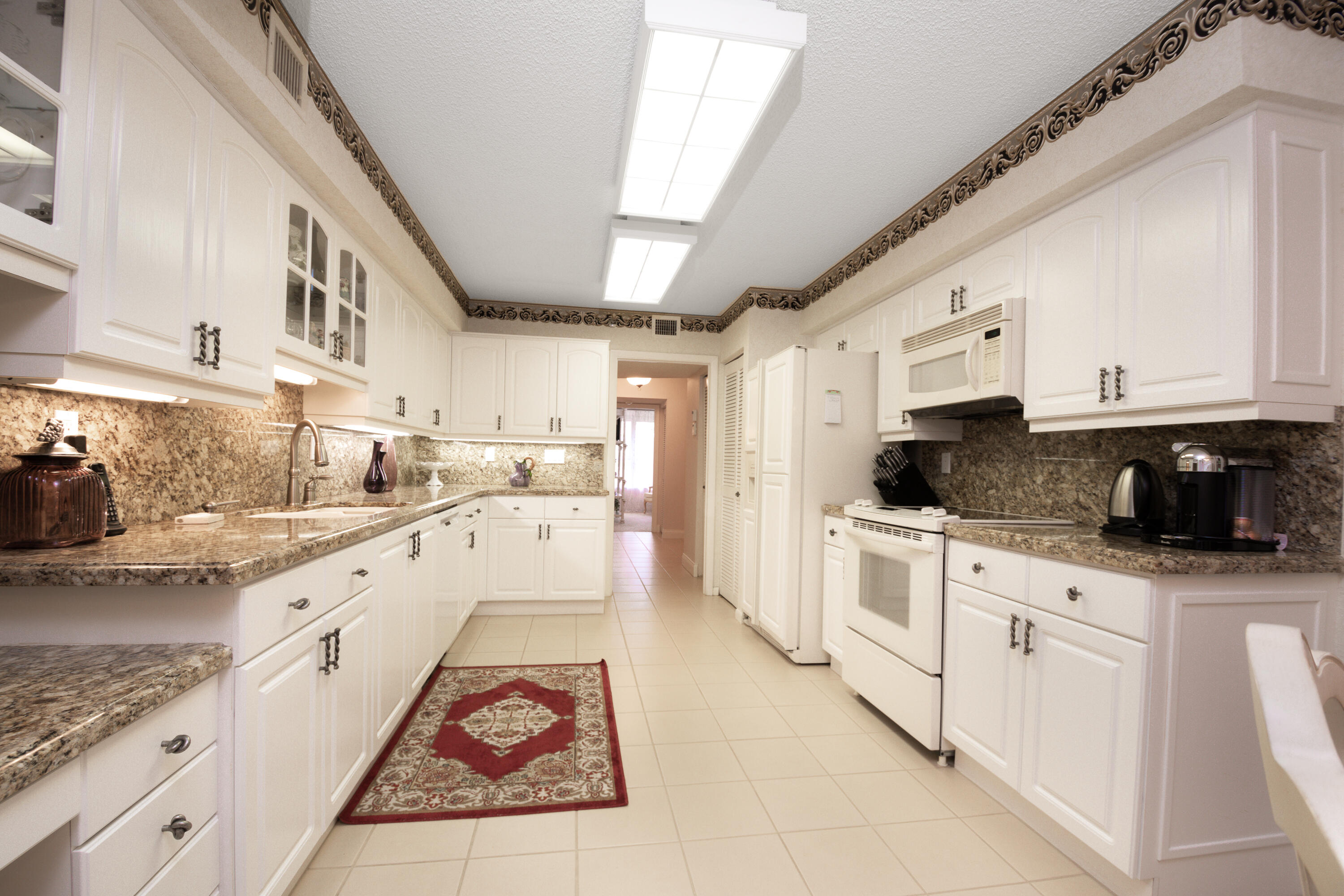 7564 Regency Lake Drive, Unit A101 Boca Raton, FL 33433 - Photo 15 of 33 Kitchen