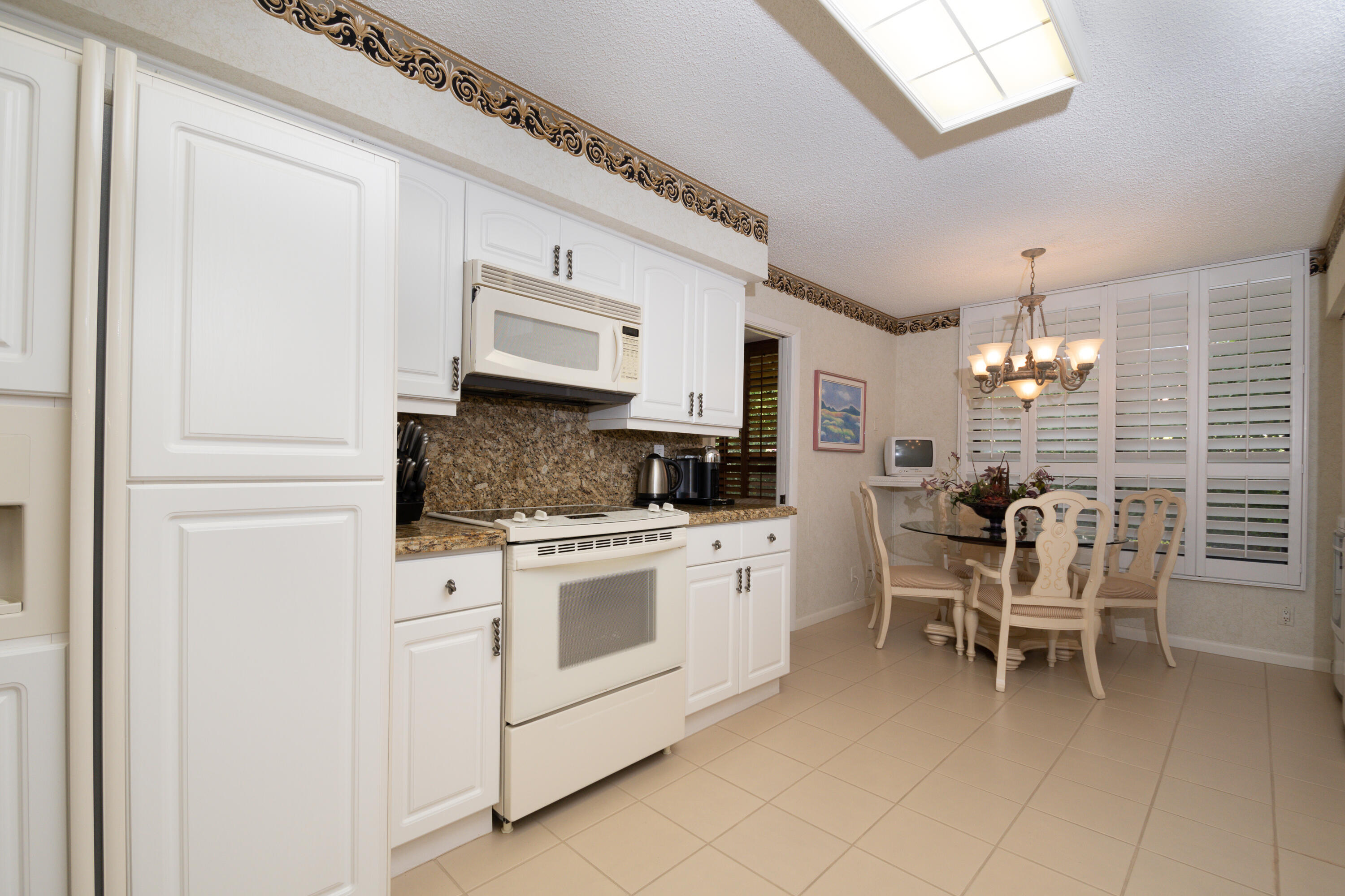 7564 Regency Lake Drive, Unit A101 Boca Raton, FL 33433 - Photo 16 of 33 Kitchen and Breakfast Nook