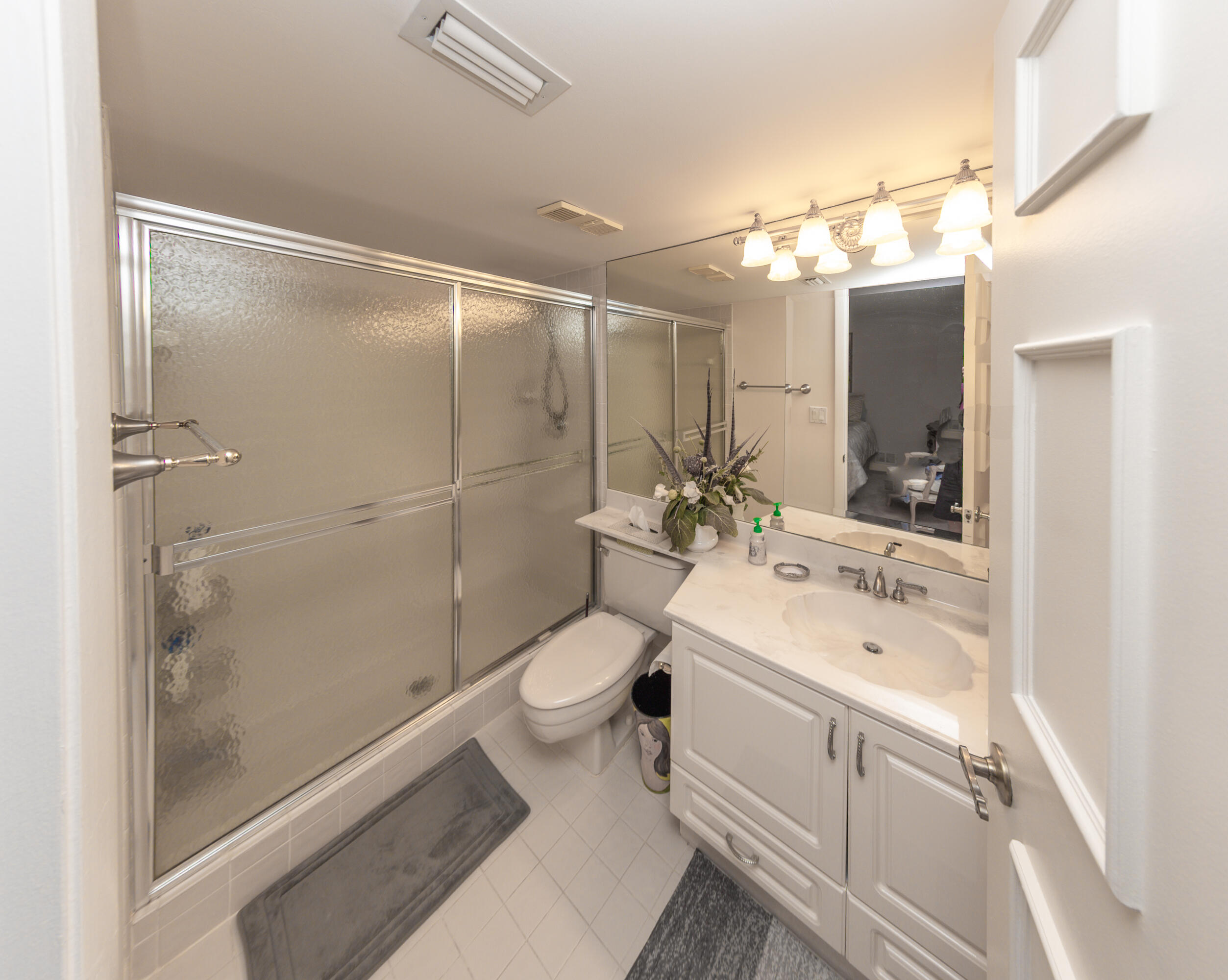 7564 Regency Lake Drive, Unit A101 Boca Raton, FL 33433 - Photo 20 of 33 Guest Bathroom