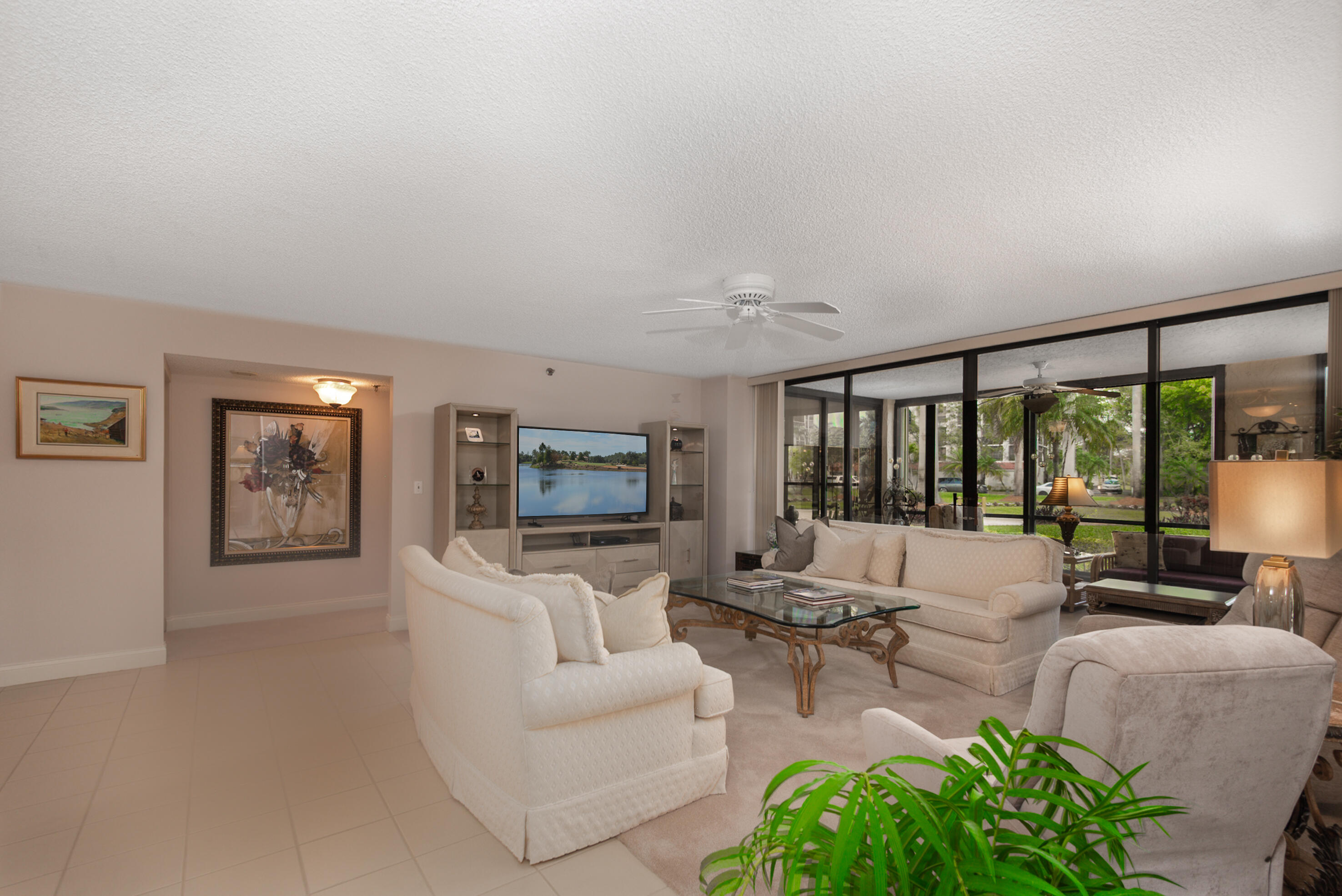 7564 Regency Lake Drive, Unit A101 Boca Raton, FL 33433 - Photo 2 of 33 Living room