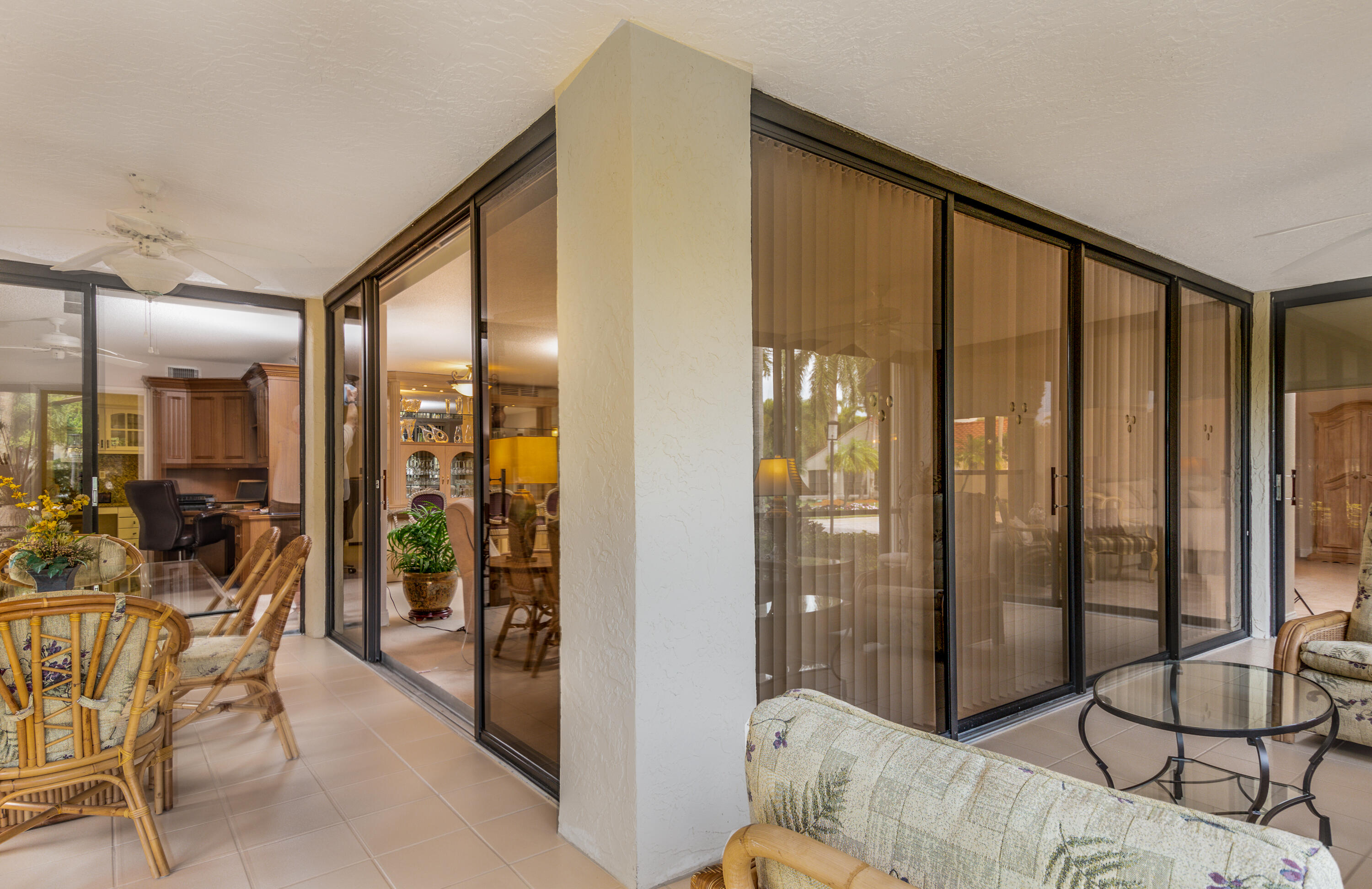 7564 Regency Lake Drive, Unit A101 Boca Raton, FL 33433 - Photo 23 of 33 Glassed-in terrace