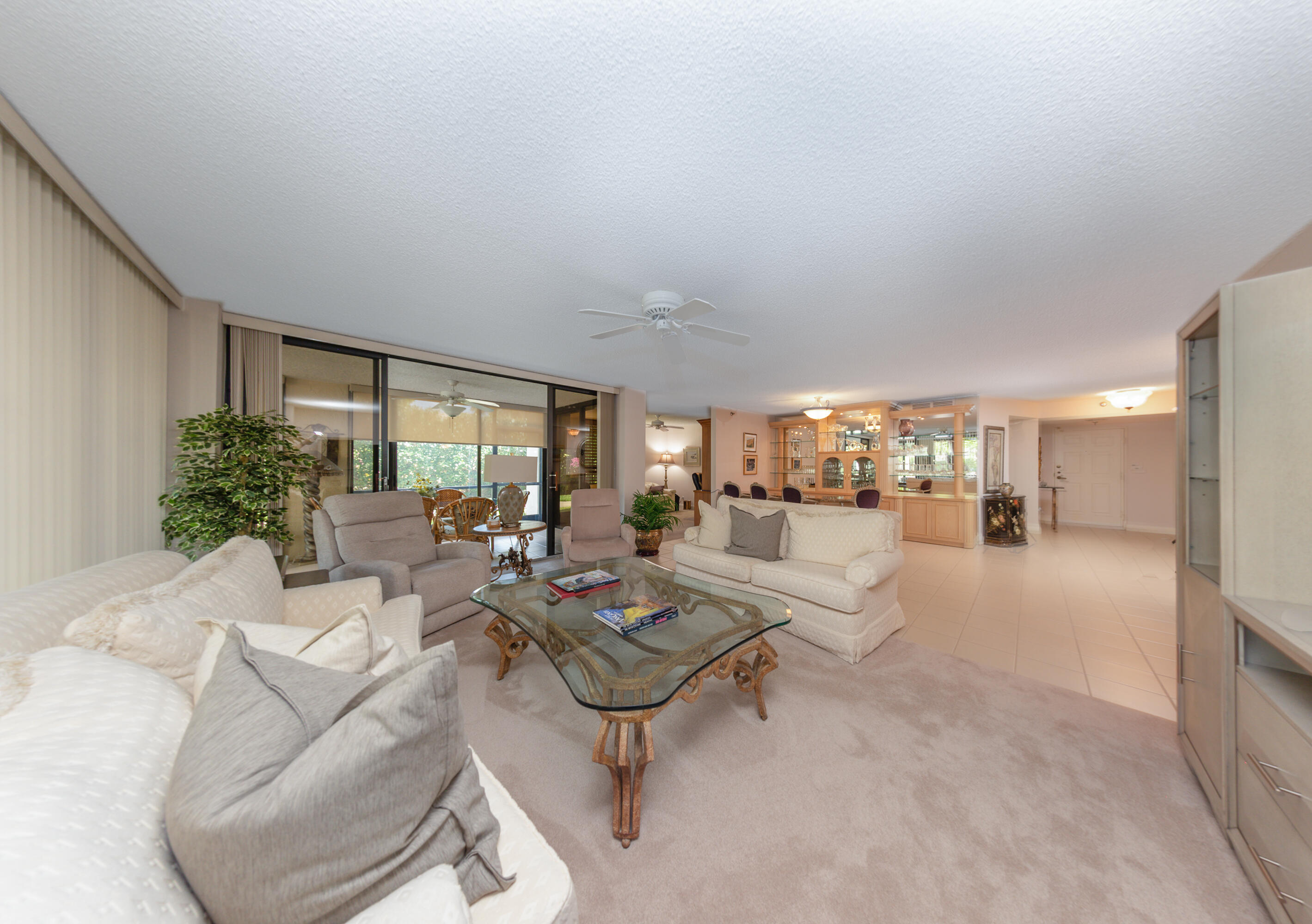 7564 Regency Lake Drive, Unit A101 Boca Raton, FL 33433 - Photo 6 of 33 Living Rm to Bar