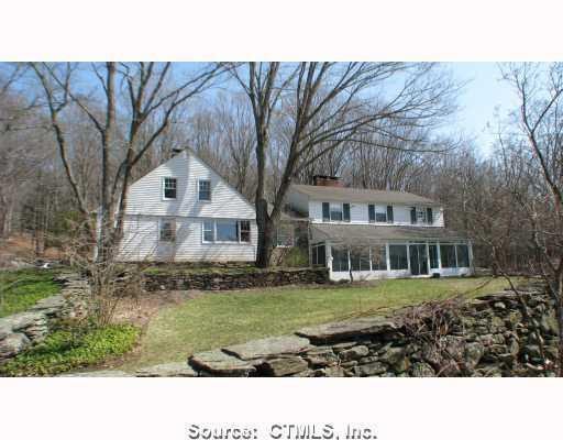 204 Old Turnpike Road Mansfield, CT 06268 - Photo 1 of 1 Exterior Back. Antique portion of home is on the left, newer addition is to the right. Huge sunroom overlooking rolling fields and gardens.