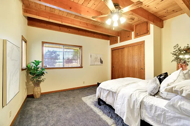 a bathroom with a granite countertop sink mirror and double
