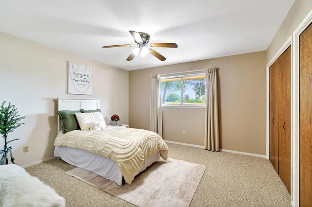 a view of a bathroom with a sink and a window