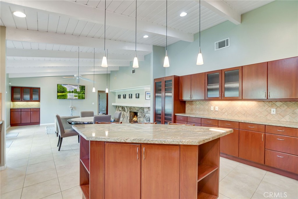 5531 Cornwall Avenue Riverside, CA 92506 - Photo 11 of 69 a kitchen with stainless steel appliances granite countertop a sink a oven a counter space and cabinets
