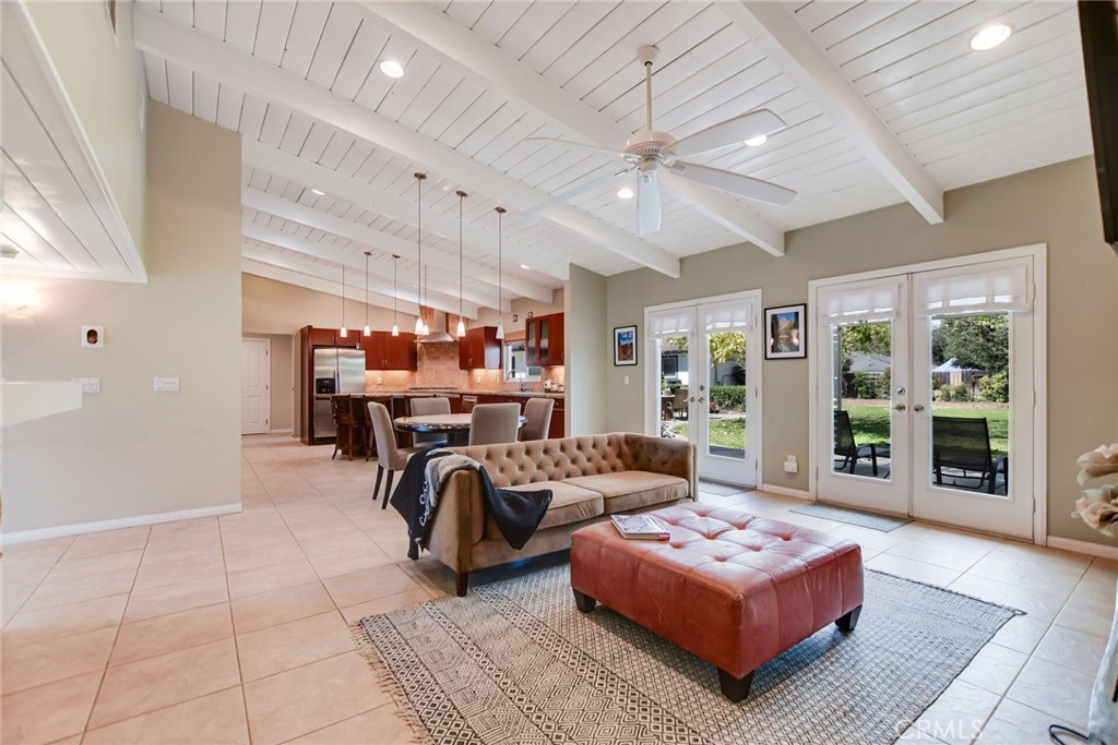 5531 Cornwall Avenue Riverside, CA 92506 - Photo 17 of 69 a living room with furniture a flat screen tv and a large window
