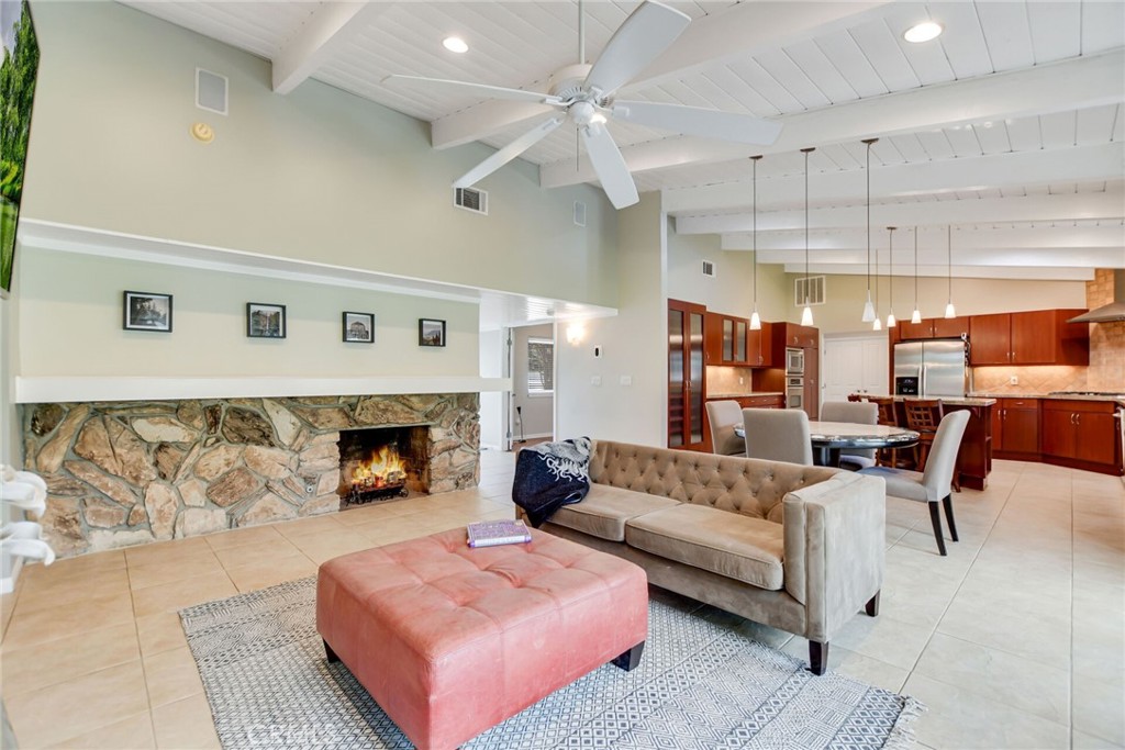 5531 Cornwall Avenue Riverside, CA 92506 - Photo 18 of 69 a living room with furniture and a fireplace