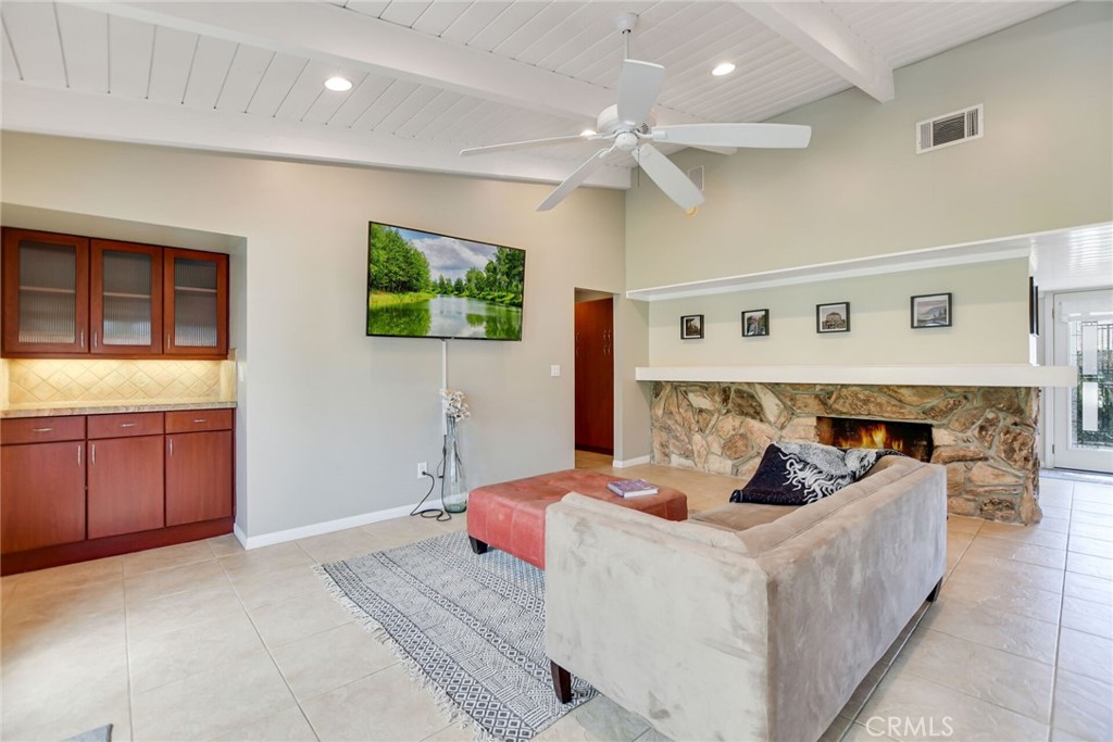 5531 Cornwall Avenue Riverside, CA 92506 - Photo 19 of 69 a living room with furniture and a flat screen tv