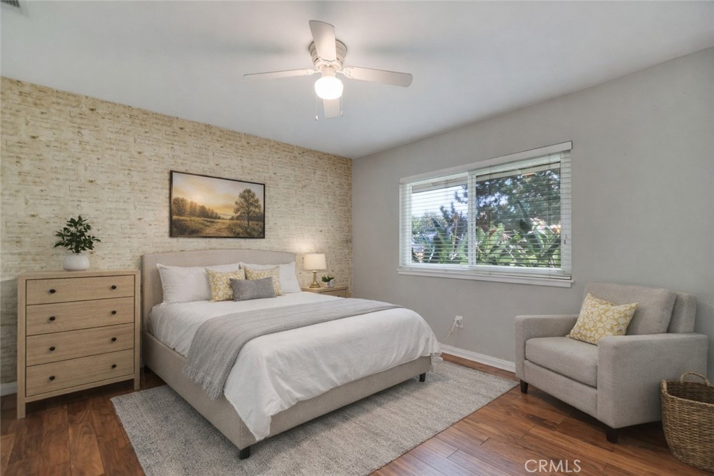 5531 Cornwall Avenue Riverside, CA 92506 - Photo 27 of 69 a bedroom with a large bed and a couch