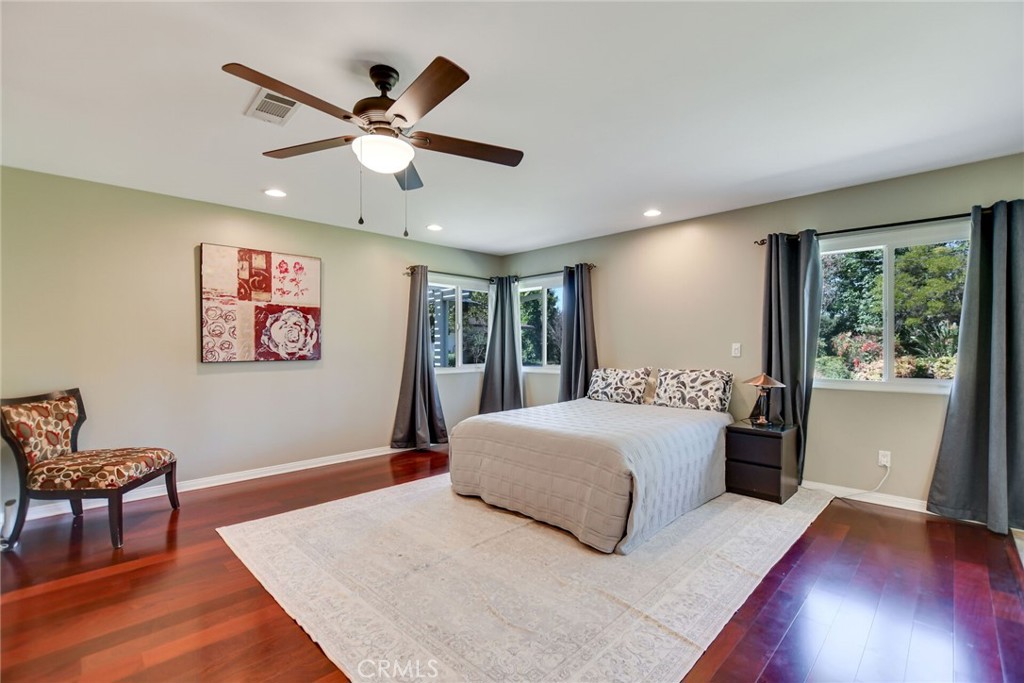 5531 Cornwall Avenue Riverside, CA 92506 - Photo 28 of 69 a bedroom with a large bed and a window