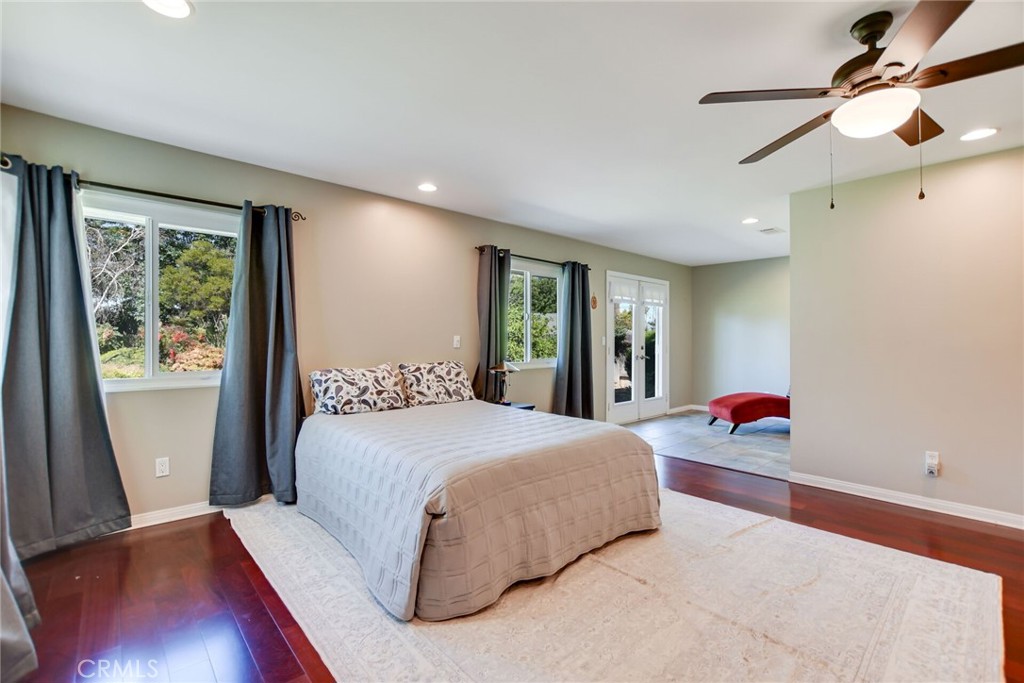 5531 Cornwall Avenue Riverside, CA 92506 - Photo 29 of 69 a bedroom with a large bed and a window