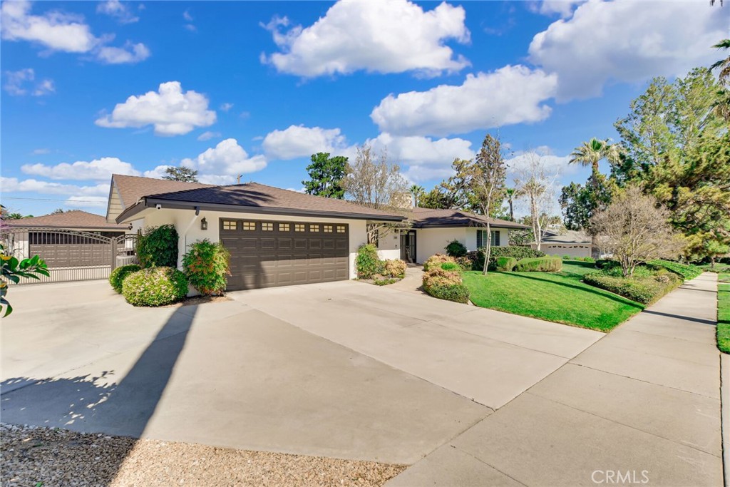 5531 Cornwall Avenue Riverside, CA 92506 - Photo 4 of 69 a front view of a house with a yard