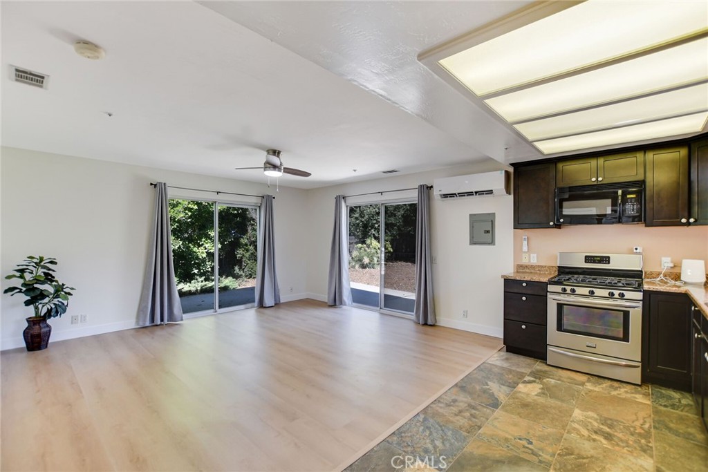 5531 Cornwall Avenue Riverside, CA 92506 - Photo 42 of 69 a view of a kitchen with a sink stove cabinets and furniture