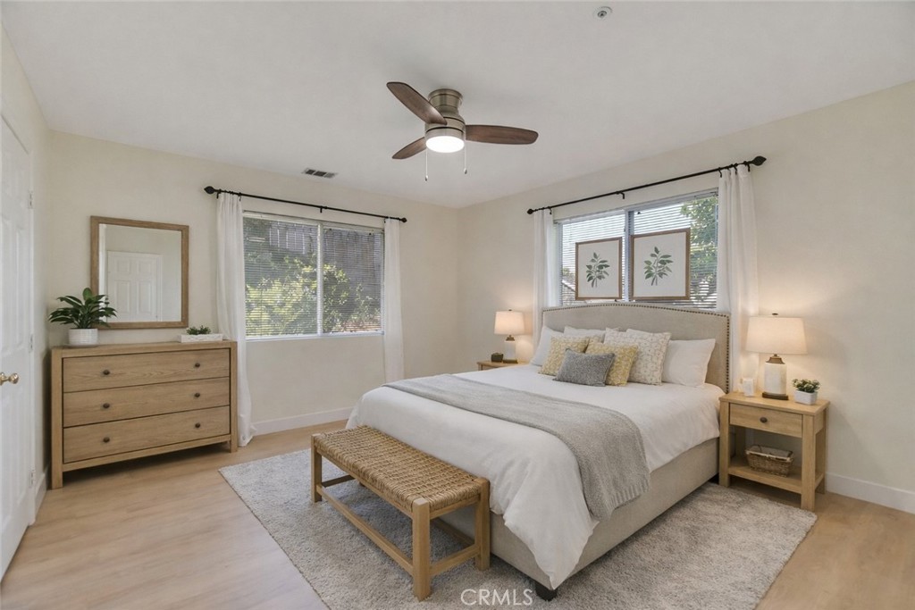 5531 Cornwall Avenue Riverside, CA 92506 - Photo 47 of 69 a bedroom with a large bed and a dresser