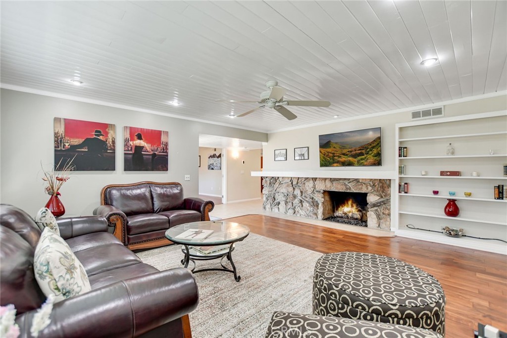 5531 Cornwall Avenue Riverside, CA 92506 - Photo 8 of 69 a living room with furniture and a fireplace