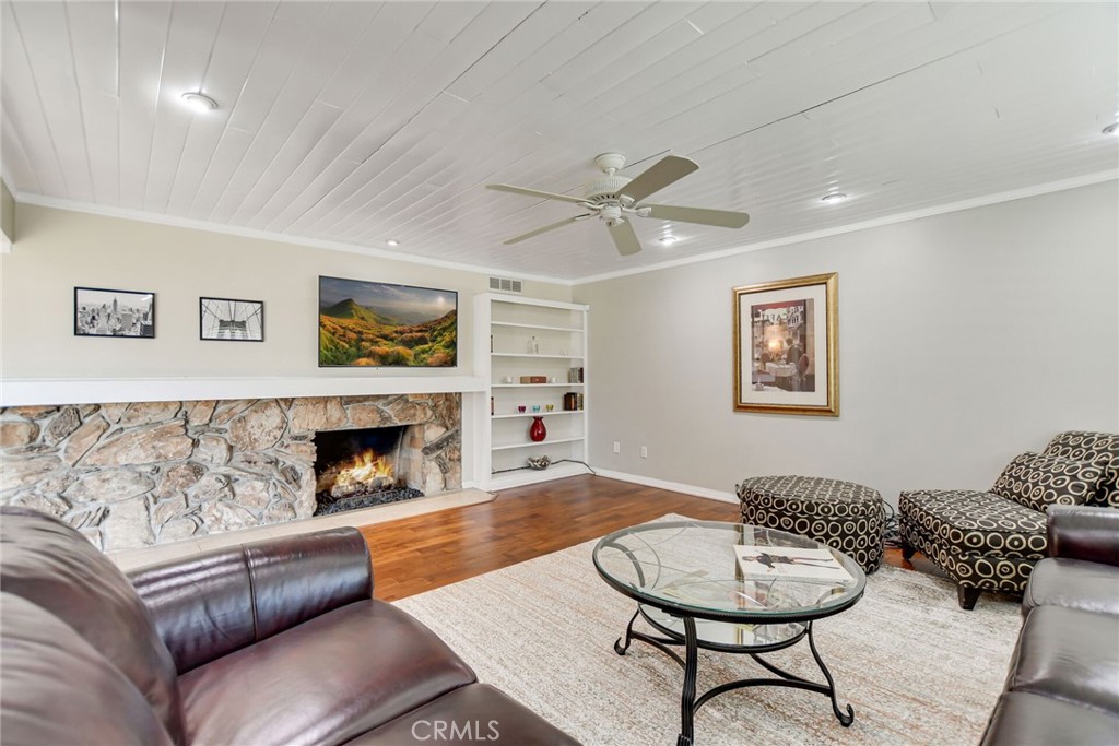 5531 Cornwall Avenue Riverside, CA 92506 - Photo 9 of 69 a living room with furniture and a fireplace