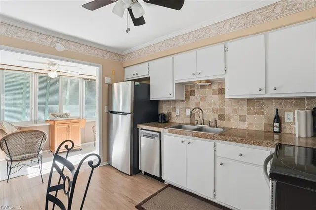 a living room with furniture and window