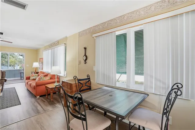 a kitchen with granite countertop a sink appliances and cabinets