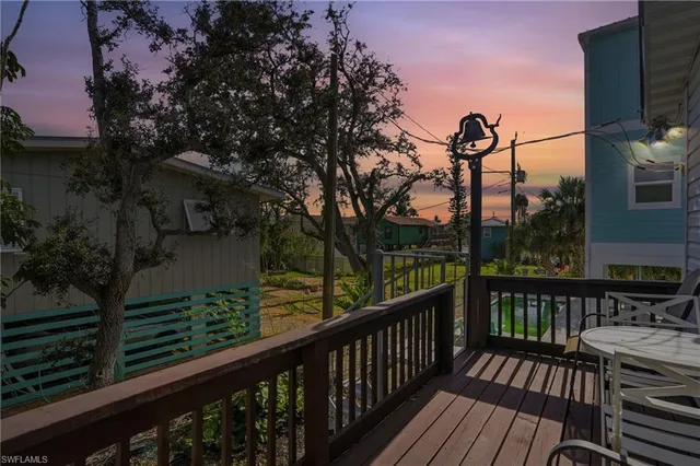 a view of a deck with furniture