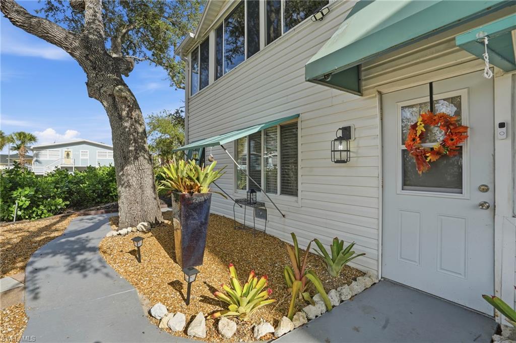 5474 Oak Ridge Avenue Fort Myers Beach, FL 33931 - Photo 10 of 50 a view of a potted plants in the patio