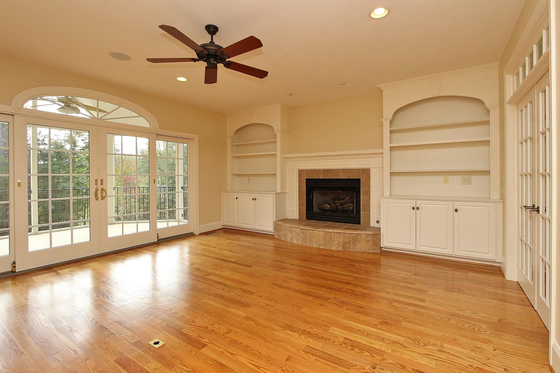 136 Claybrook Court Blue Ridge, VA 24064 - Photo 15 of 86 a view of an empty room with a window and wooden floor