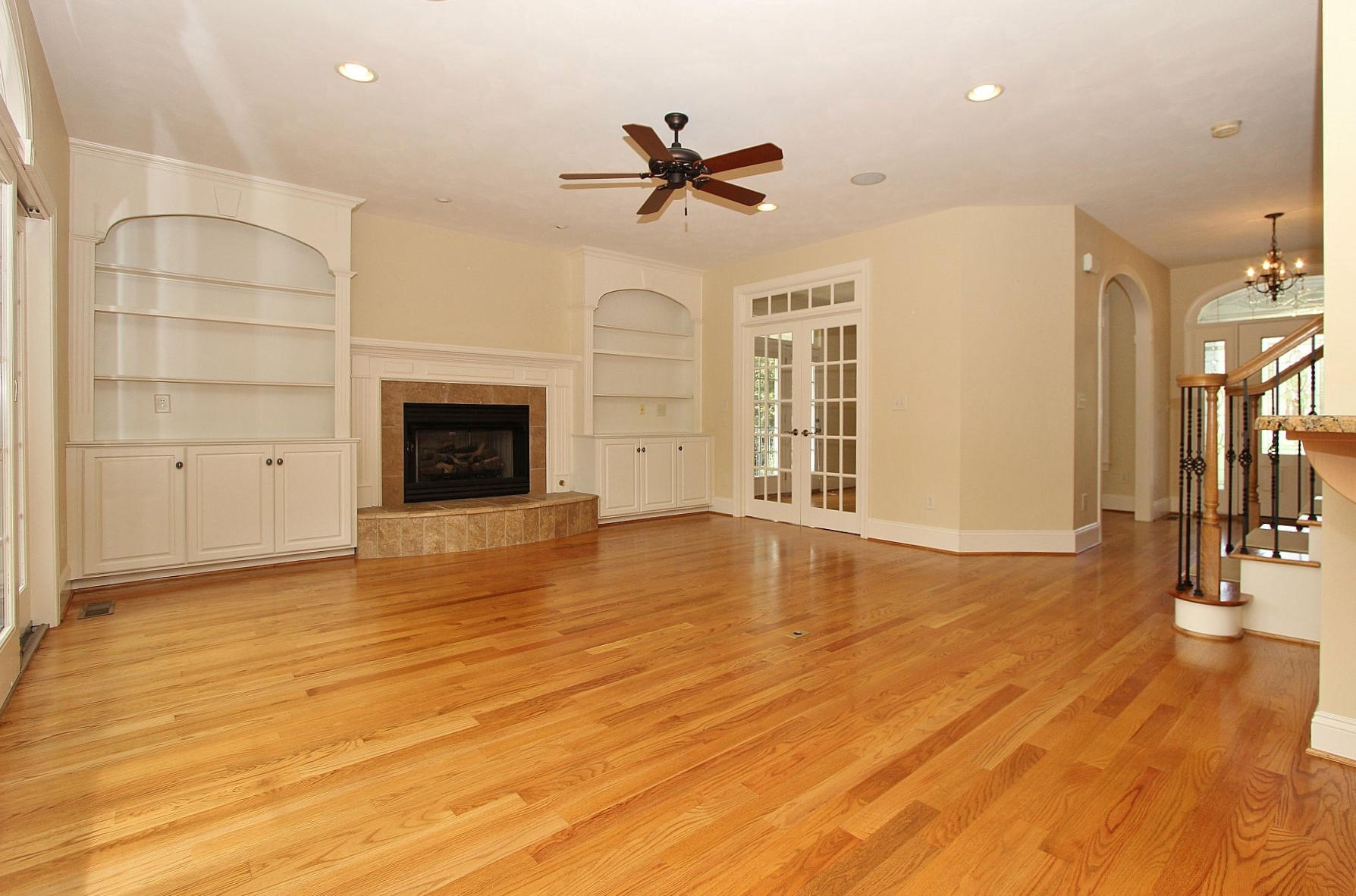 136 Claybrook Court Blue Ridge, VA 24064 - Photo 20 of 86 a view of empty room with wooden floor and fireplace