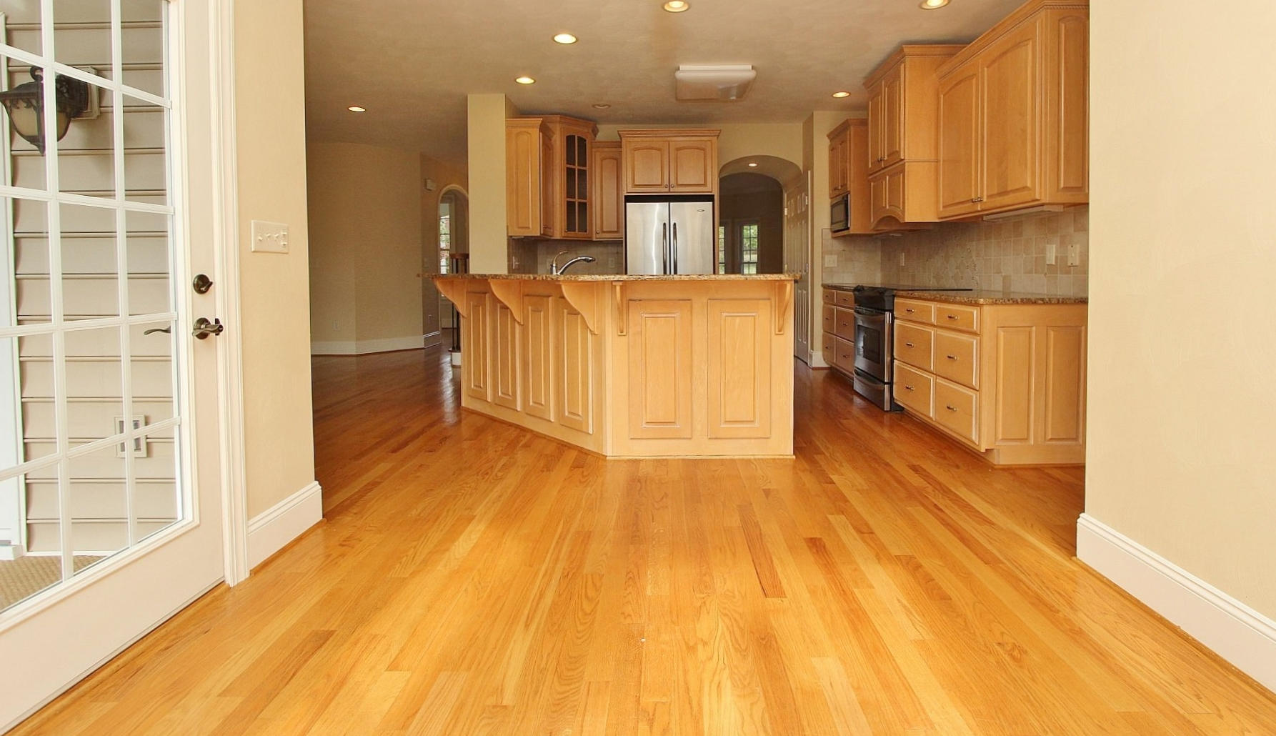 136 Claybrook Court Blue Ridge, VA 24064 - Photo 23 of 86 a kitchen with stainless steel appliances wooden floors and large window