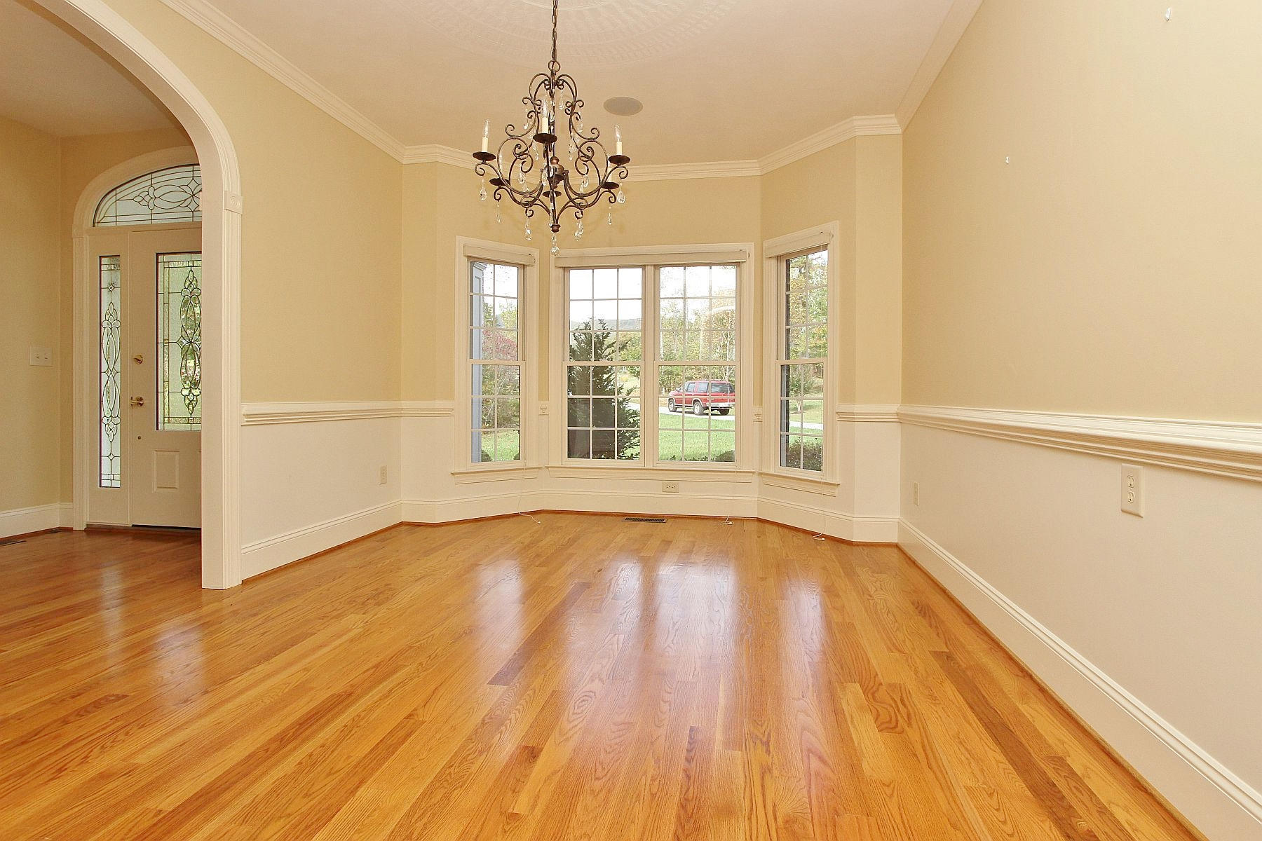 136 Claybrook Court Blue Ridge, VA 24064 - Photo 28 of 86 a view of an empty room with wooden floor and a window