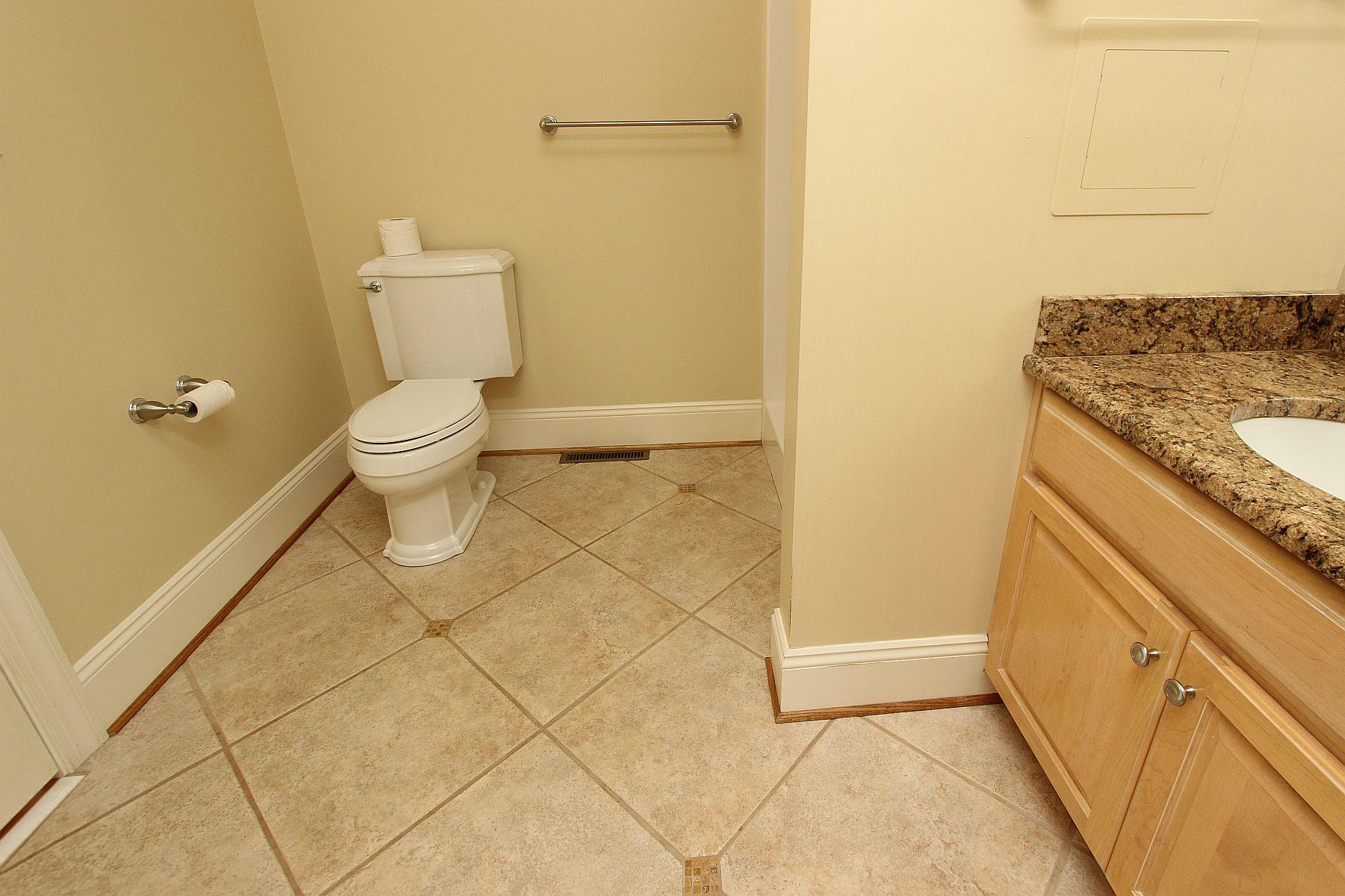 136 Claybrook Court Blue Ridge, VA 24064 - Photo 34 of 86 a bathroom with a granite countertop sink and a toilet