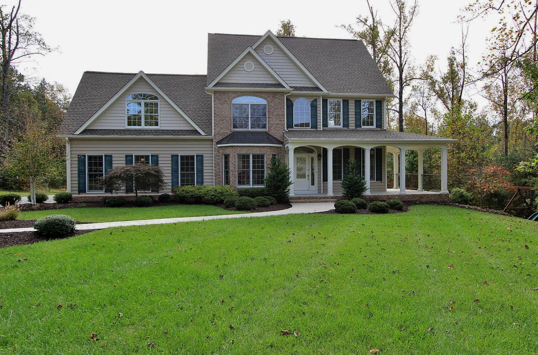 136 Claybrook Court Blue Ridge, VA 24064 - Photo 5 of 86 front view of a house with a yard