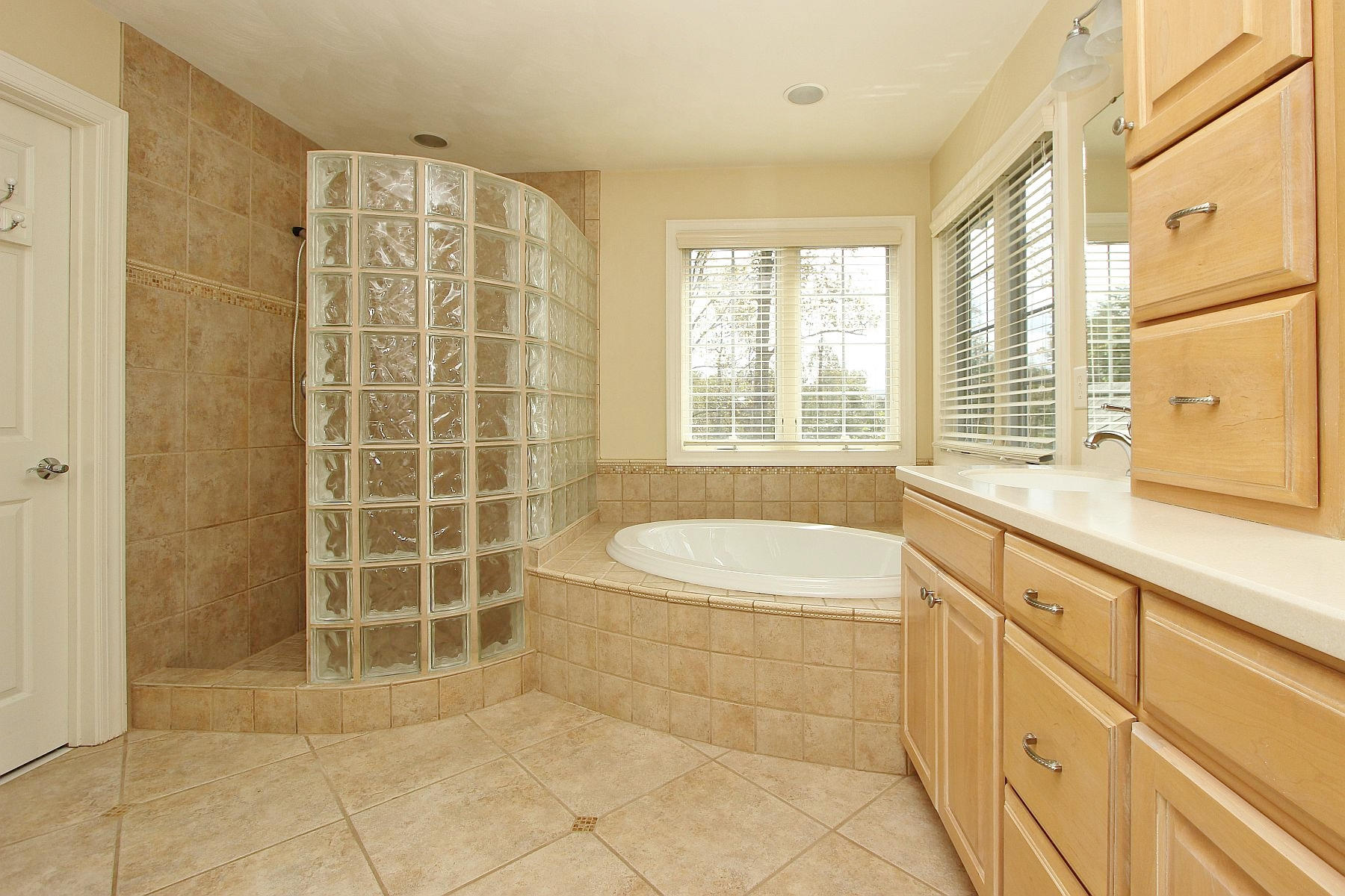 136 Claybrook Court Blue Ridge, VA 24064 - Photo 44 of 86 a spacious bathroom with a granite countertop sink a toilet and a bathtub