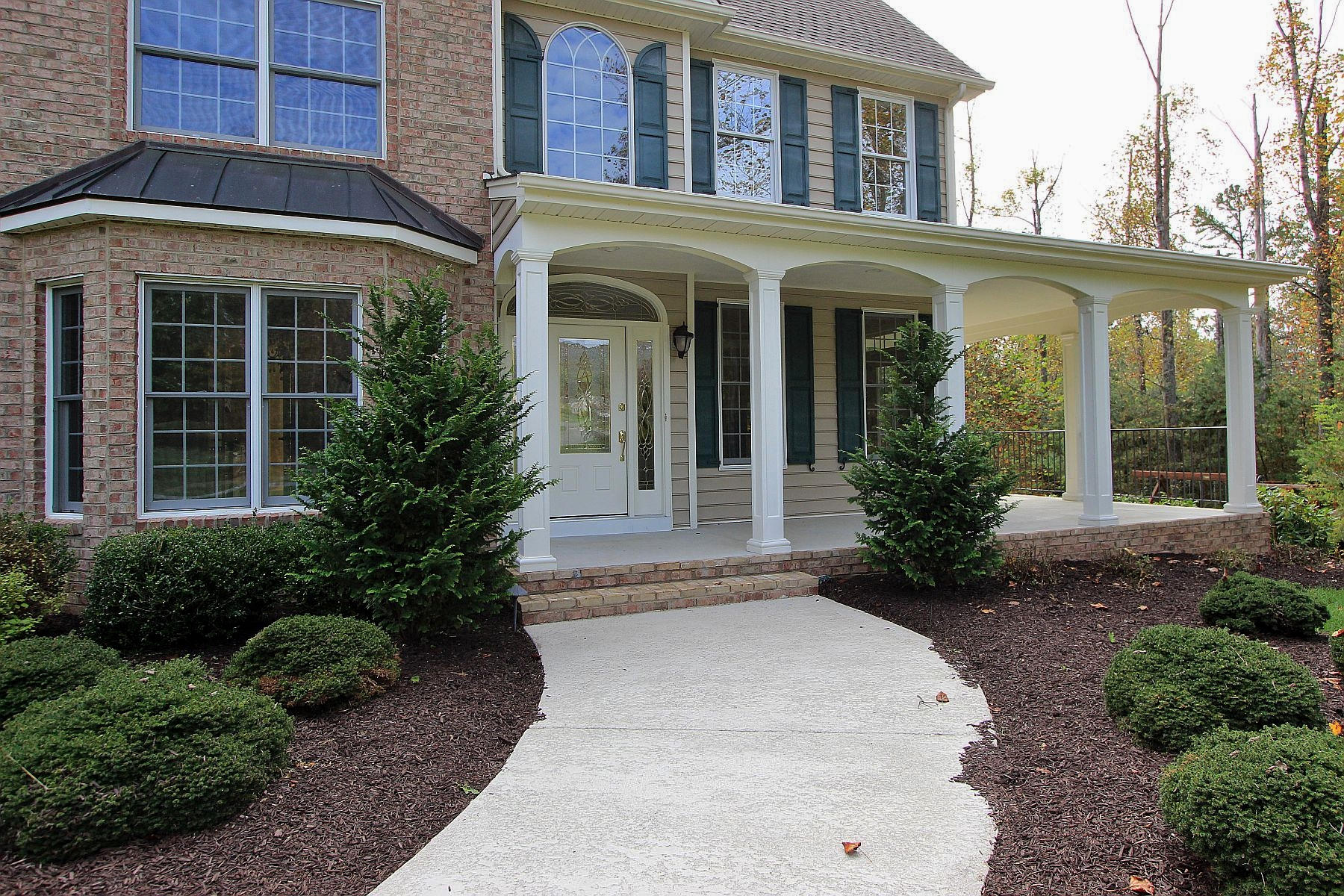 136 Claybrook Court Blue Ridge, VA 24064 - Photo 7 of 86 a front view of a house with garden