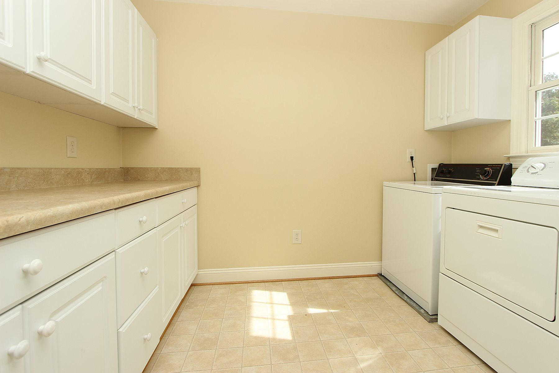136 Claybrook Court Blue Ridge, VA 24064 - Photo 64 of 86 a view of a storage and utility room with washer and dryer