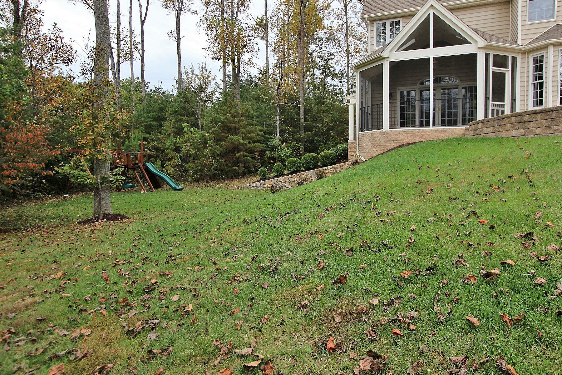 136 Claybrook Court Blue Ridge, VA 24064 - Photo 81 of 86 front view of a house with a yard