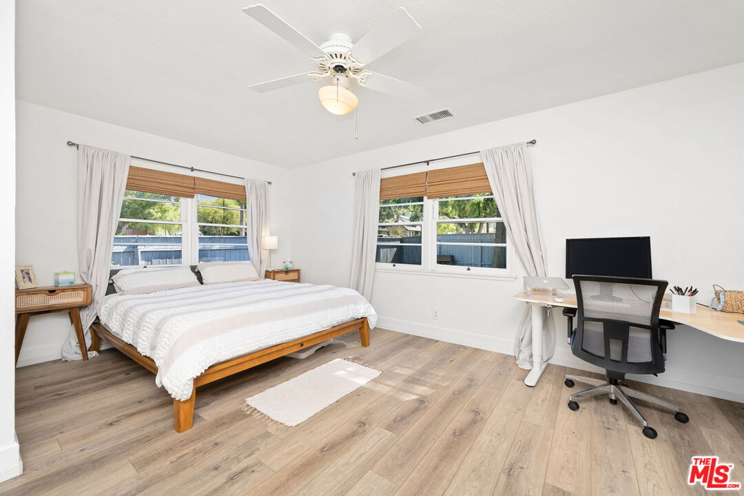 1732 Fiske Avenue Pasadena, CA 91104 - Photo 12 of 23 a bedroom with a bed and a desk