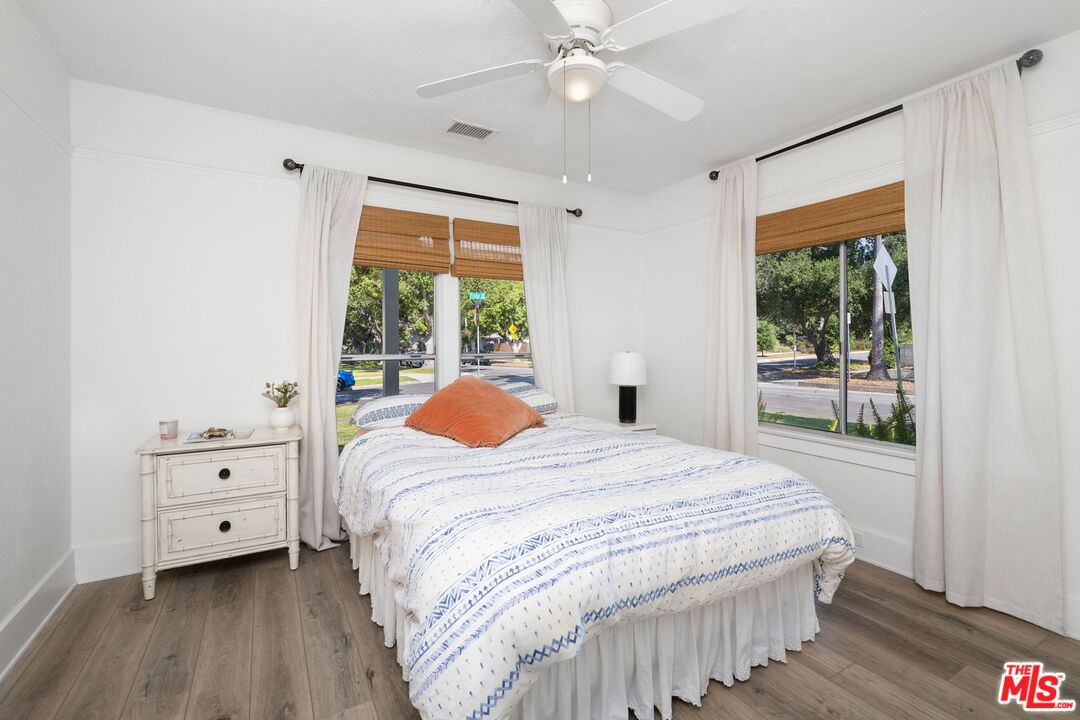 1732 Fiske Avenue Pasadena, CA 91104 - Photo 15 of 23 a bedroom with a bed and a window