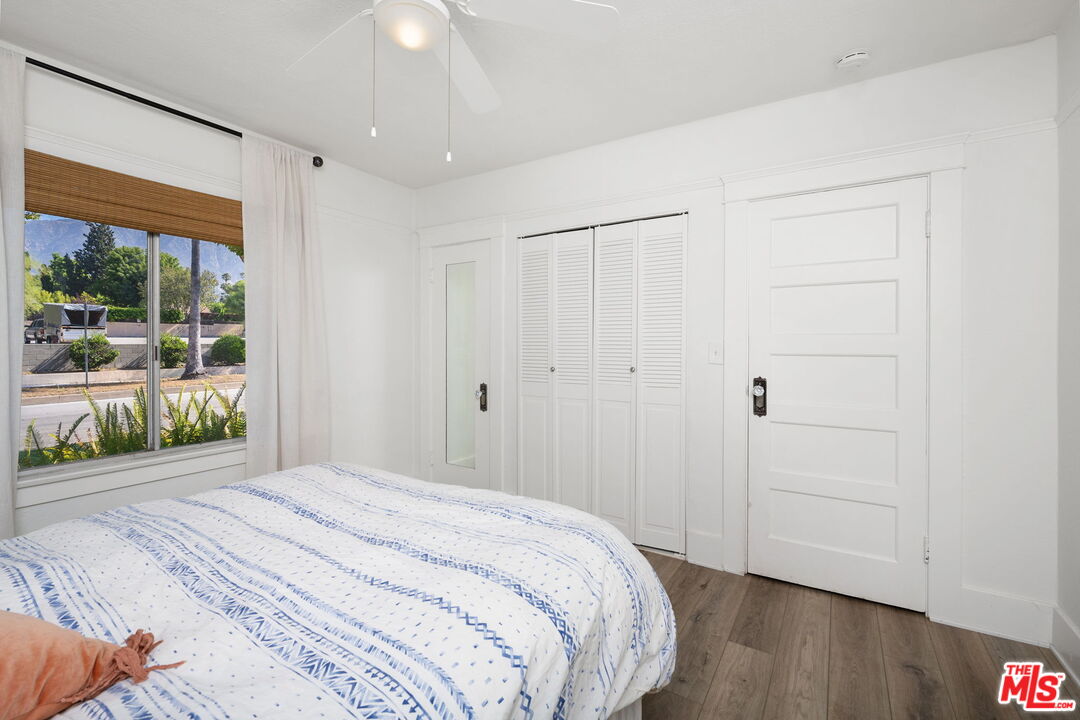 1732 Fiske Avenue Pasadena, CA 91104 - Photo 16 of 23 a bedroom with a bed and a large window