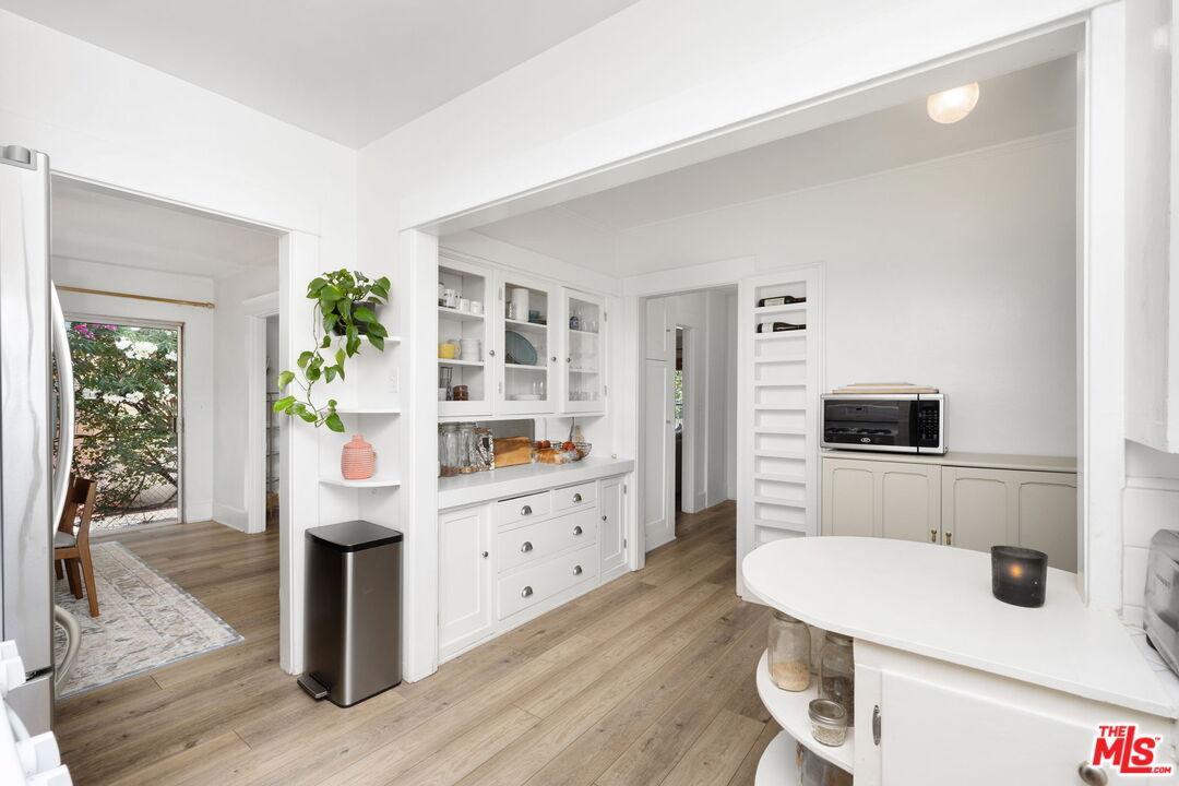1732 Fiske Avenue Pasadena, CA 91104 - Photo 9 of 23 a kitchen with sink and wooden floor