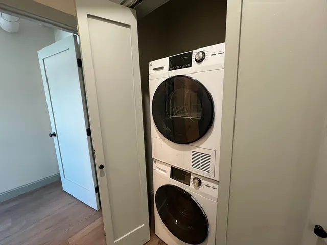 a close up view of a washer and dryer in a utility room