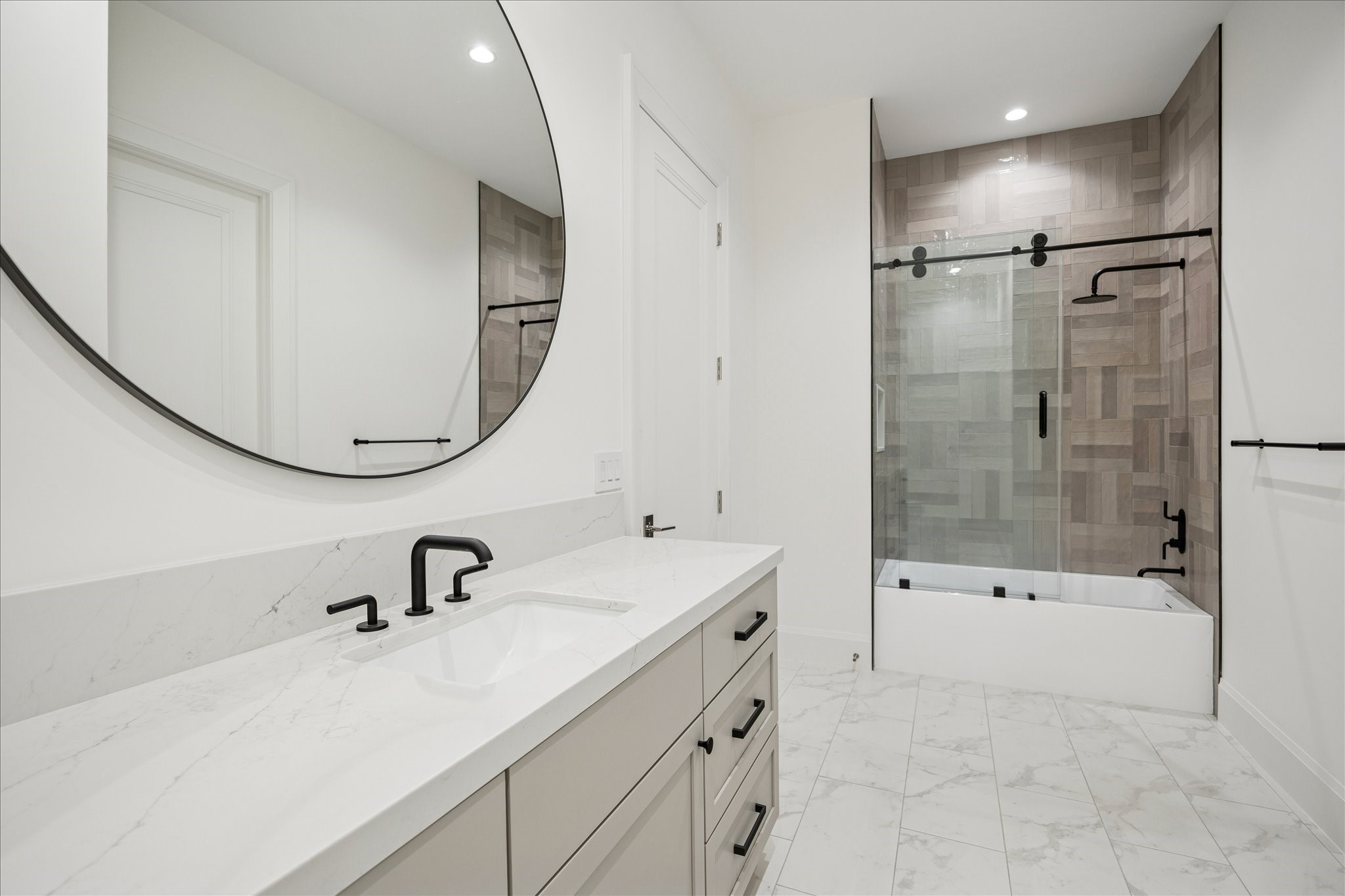 267 Maple Valley Road Houston, TX 77056 - Photo 32 of 40 a bathroom with a sink a toilet and shower
