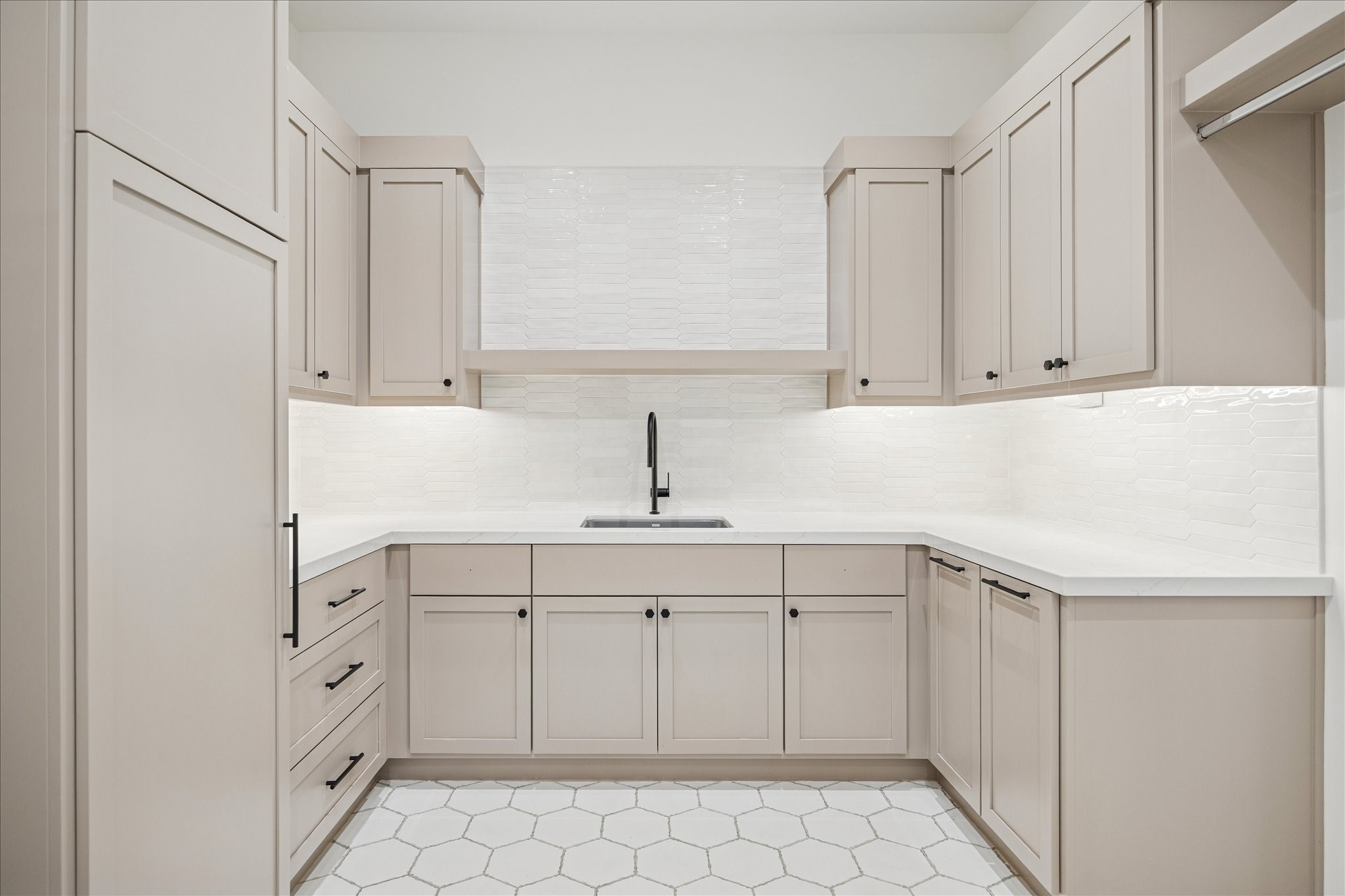 267 Maple Valley Road Houston, TX 77056 - Photo 35 of 40 a kitchen with white cabinets and white appliances