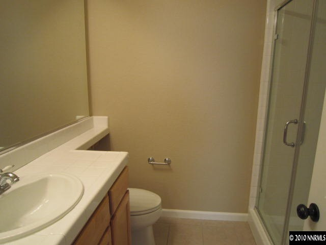 2540 Country Falls Lane Reno, NV 89521 - Photo 11 of 13 a bathroom with a sink and toilet
