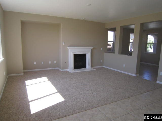 2540 Country Falls Lane Reno, NV 89521 - Photo 3 of 13 an empty room with windows